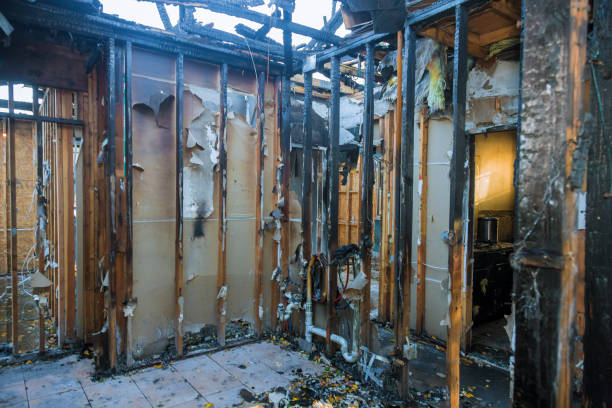 Professional Fire Damage Cleanup technician working in Clayton, WI